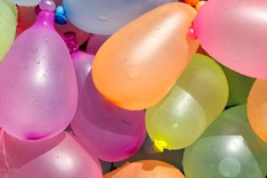 A group of colorful water balloons.