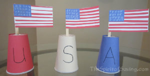 A paper cup craft with American Flags.