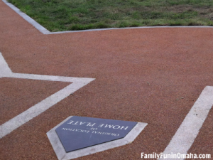 A close up of home plate for the Omaha Photo Scavenger Hunt for kids.