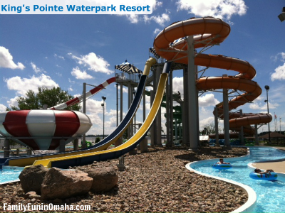 A waterslide next to a lazy river at King\'s Pointe Outdoor Waterpark.