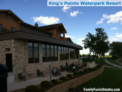 The outside windows of a building at King\'s Pointe Waterpark Resort. 