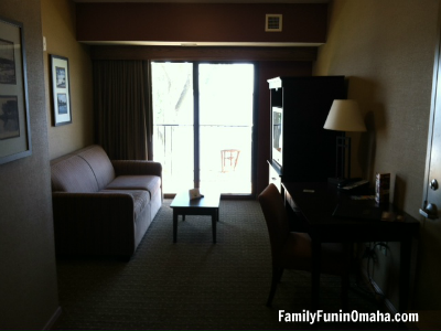The inside of a hotel room sittng area at King\'s Pointe Waterpark Resort. 