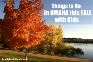 Fall trees in front of a pond with overlay text that reads Things to Do in Omaha this Fall with Kids