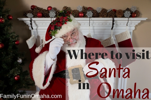 Santa Claus in front of a fireplace with overlay text that reads Where to See Santa in Omaha