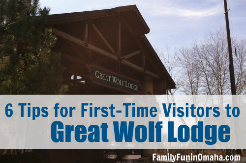 A log decorated building with overlay text that reads First Time Visitors to Great Wolf Lodge