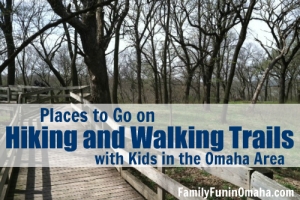 A bridge in a wooded area with overlay text that reads Places to Go Hiking and Walking Trails with Kids in Omaha