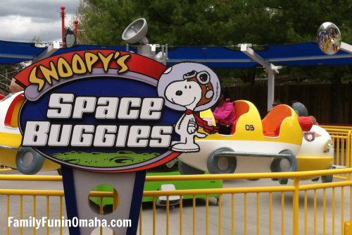 A sign for Snoopy\'s Space Buggies in front of the ride at Worlds of Fun.