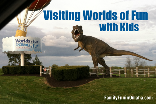 A large dinosaur statue with overlay text that reads Visiting Worlds of Fun with Kids