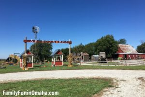 The entrance sign and ticket booths at Skinny Bones.