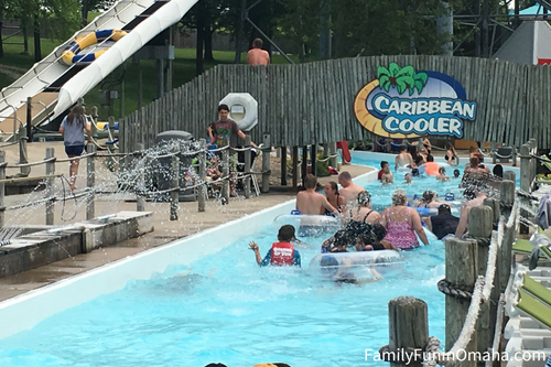 A group of people swimming in lazy river at Oceans of Fun.