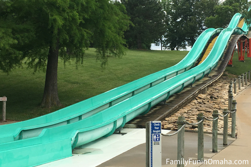 A close up of two long waterslides at Oceans of Fun.