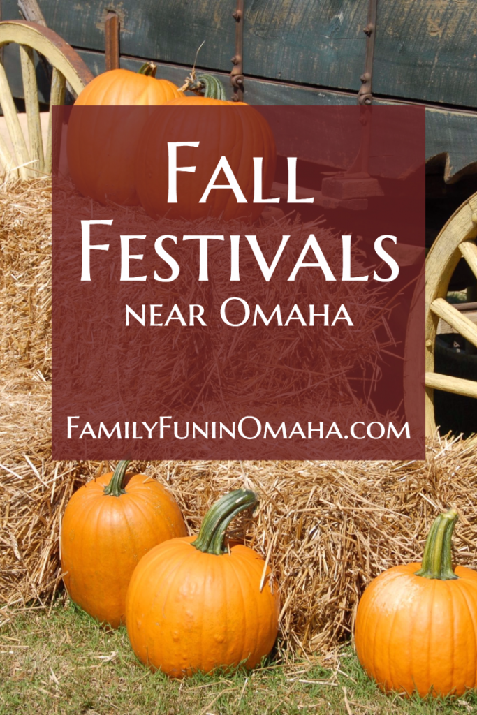 A fall display of pumpkins an cart with overlay text that reads Fall Festivals near Omaha