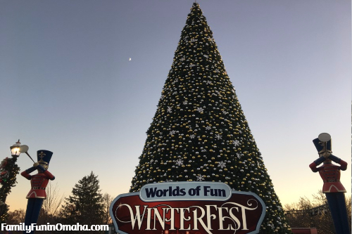 A large decorated Christmas Tree with a Winter Fest Sign at Worlds of Fun