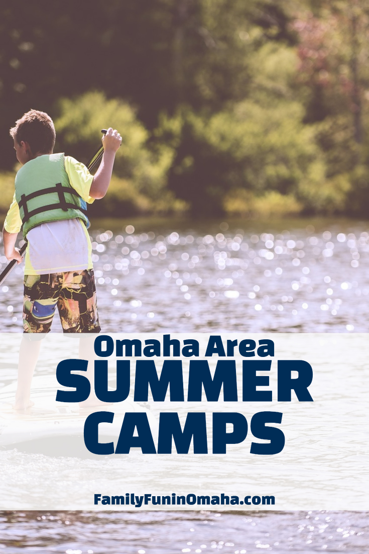 A boy paddleboarding on a lake with overlay text that reads Omaha Area Summer Camps