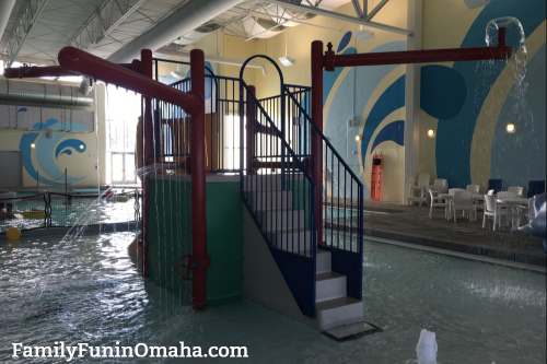 A close up of stairs in a pool at Omaha Kroc Center Family Aquatic Center.