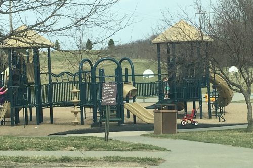 A close up of the playground and slide at Elk Creek Park in Omaha