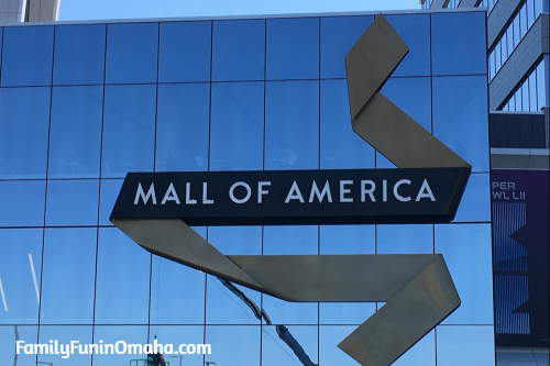 Glass building with a sign that says Mall of America