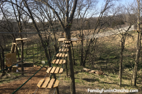 A close up of a wooden climbing feature at Go Ape Treetop Adventure Course at Mahoney State Park. 