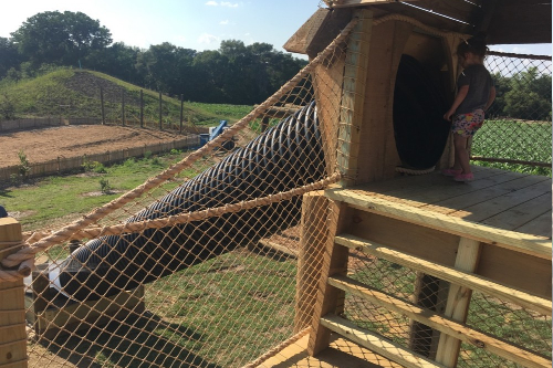 A close up of a wooden structure at Vala\'s Pumpkin Patch Prairie Town