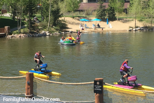 A group of people in paddle boats at Copper Mountain Adventure Park.