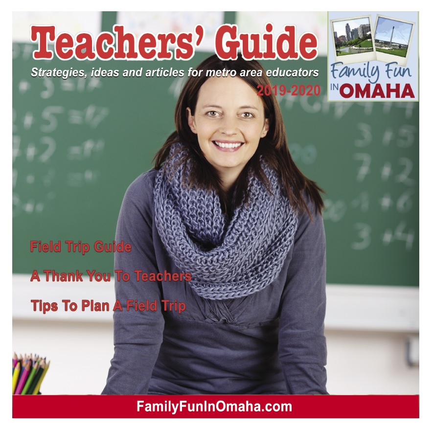 A woman posing for the camera with overlay text that reads Teachers\' Guide.