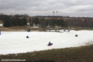 A group of people sledding at Mahoney State Park